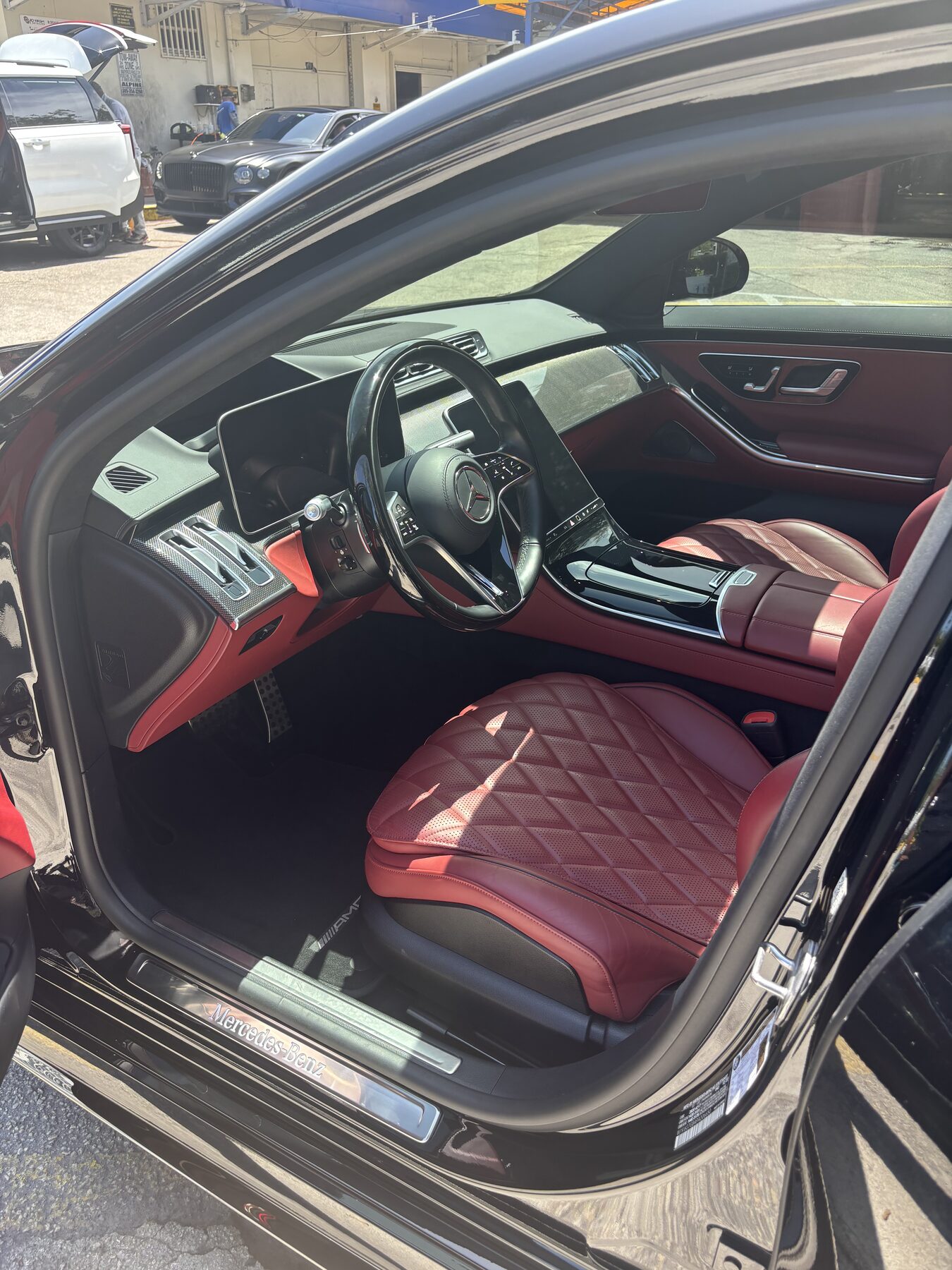 Freshly detailed Mercedes-Benz interior with clean leather seating and dashboard